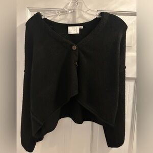 Lush black sweater. Perfect condition never worn.